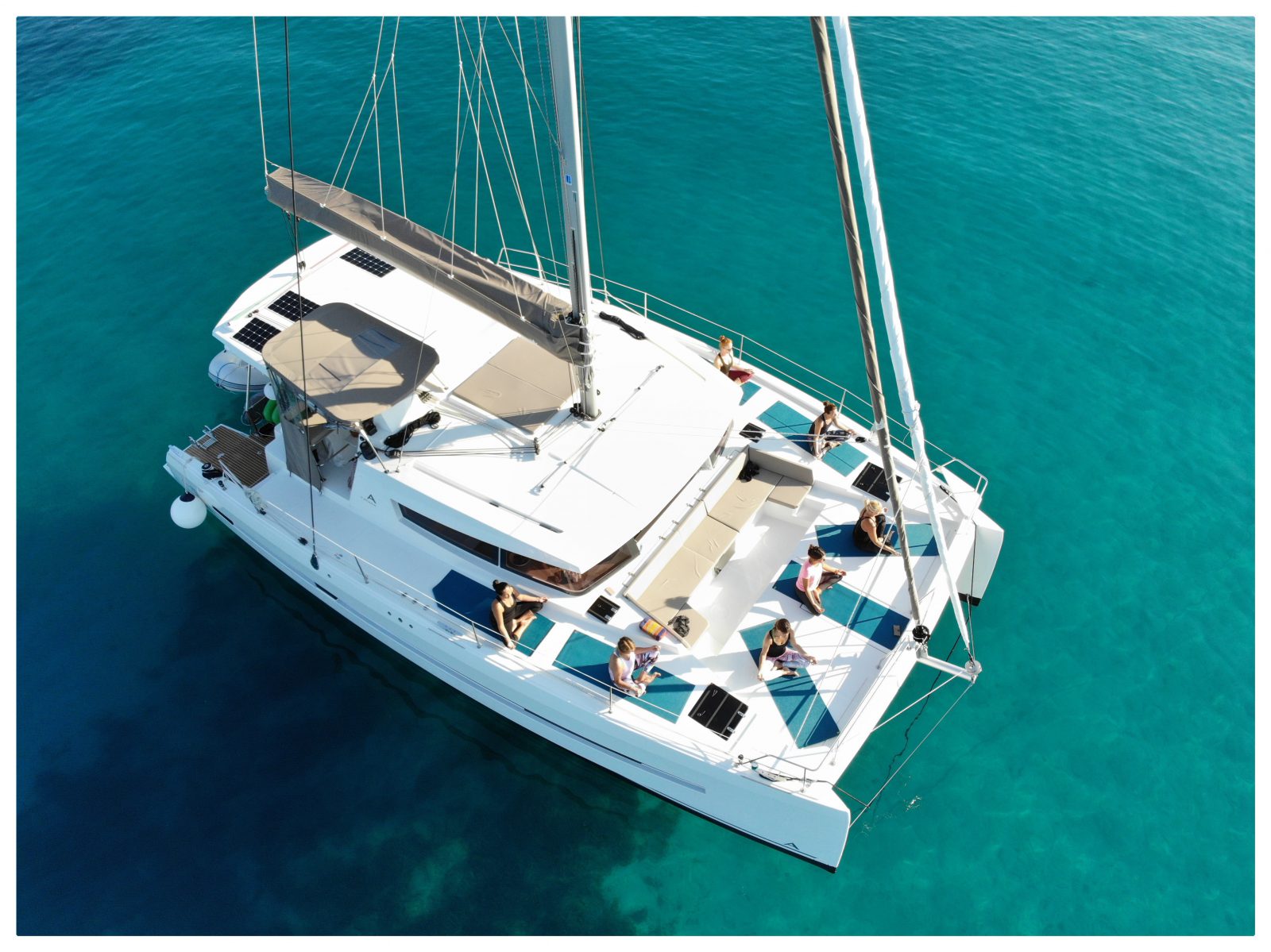 Yoga practice on a catamaran