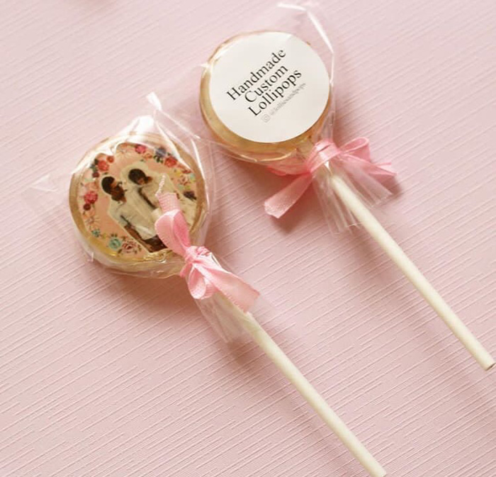 Custom-made lollipop with edible flower petals