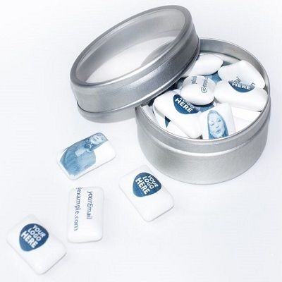 Custom Imprinted Small Tin with Sugar-Free Gum are available in trendy hinged, square shaped tin in multiple color choices; available filler is sugar free gum; Tin Made In China; Great holiday gifts and mailer items. Order these custom gums right away to get free design, free online proofs and fastest turnaround offers.